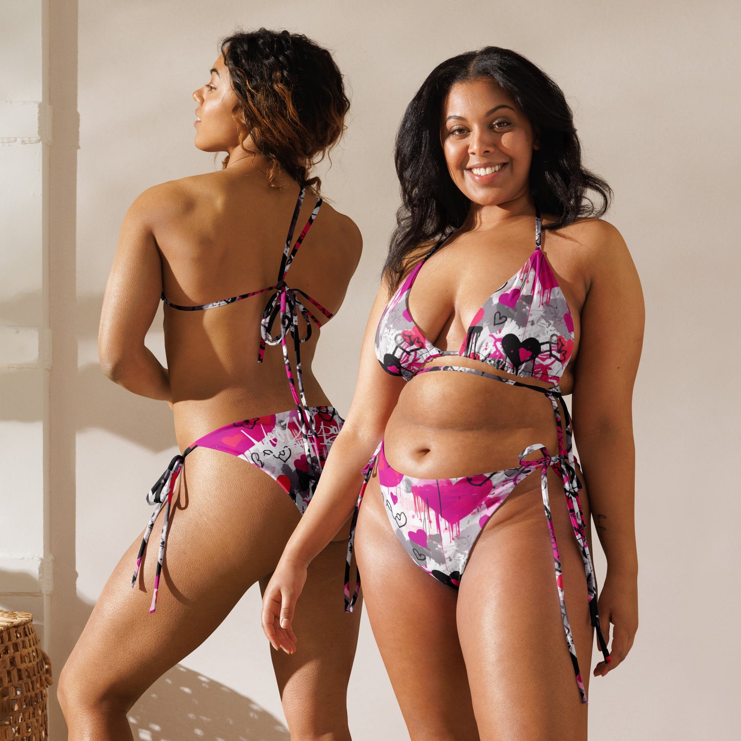 "Pink Love" Bikini by MeaKulpa, where vibrant pink meets timeless elegance. This eye-catching swimwear is designed to make you feel confident and stylish under the sun. Our alternate text captures the essence of two friends enjoying a day at the beach, both adorned in the "Pink Love" Bikini, radiating joy and embracing the carefree spirit of summer. Elevate your swimwear collection with this statement piece that embodies the MeaKulpa ethos.