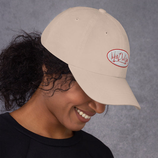 Embrace the subtlety of style with the MeaKulpa Stone-Colored Hat, worn by a smiling girl casting a mysterious gaze downward. This neutral tone exudes sophistication, while her playful smile hints at the urban coolness within. Elevate your look, create intrigue. 