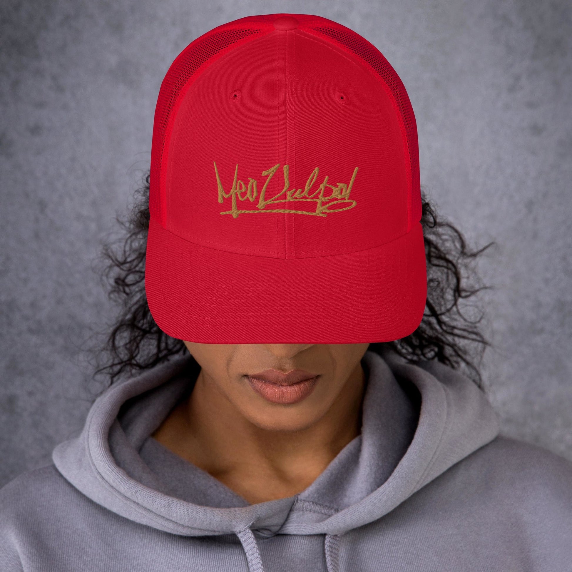 Red Mesh Detail of MeaKulpa Trucker Cap Turn heads from every angle with the MeaKulpa Red Trucker Cap. Admire the sleek back view where the red mesh adds a stylish touch to the overall design. This cap is a symphony of color and sophistication.