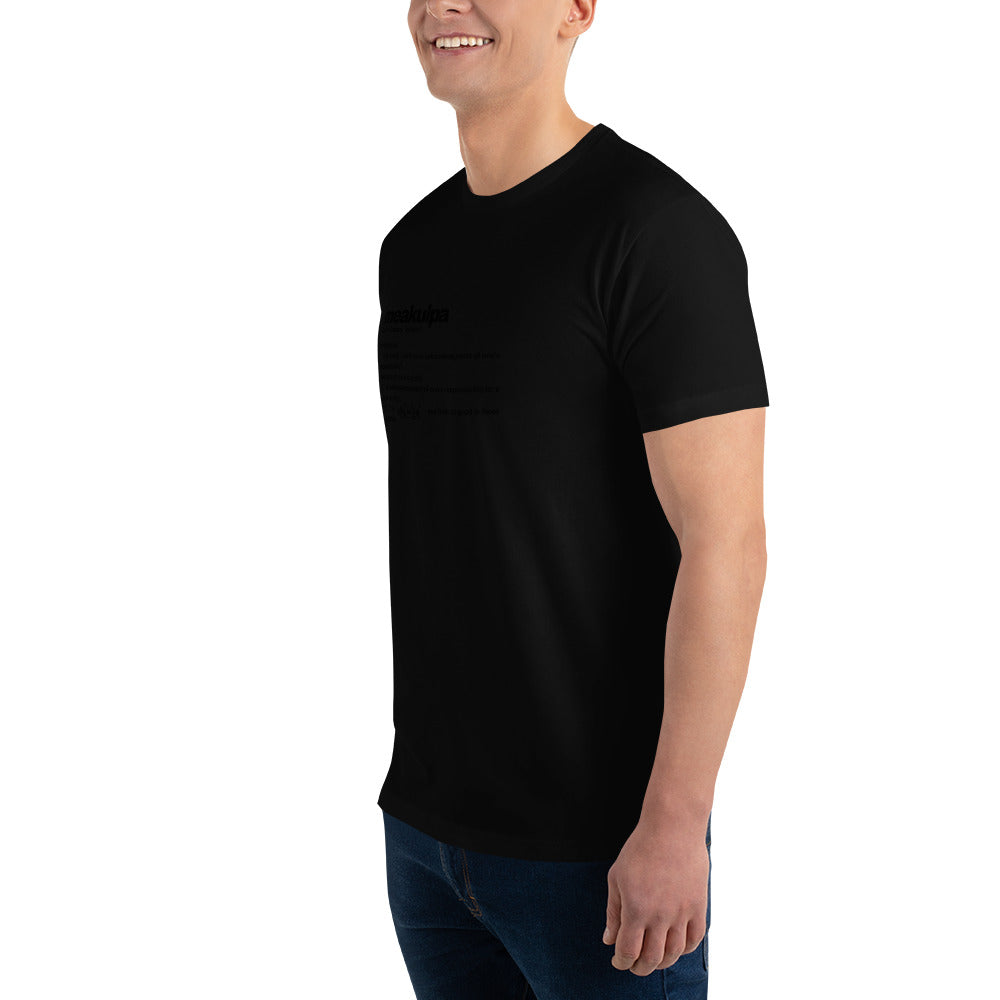 Side angle of Meakupa black on black Definition t-shirt. Whether you're exploring the cityscape or embracing a laid-back vibe, the MeaKulpa Essential Black Tee is your canvas for self-expression. Redefine your style journey with a touch of monochrome magic.